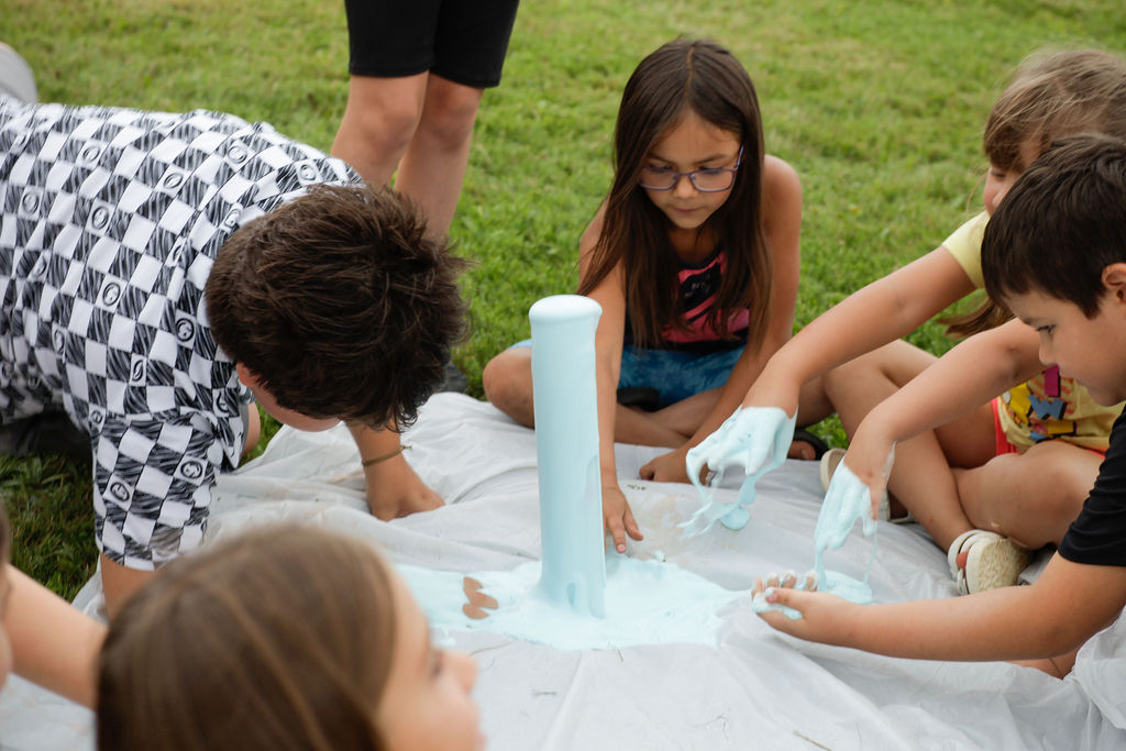 Summer Camp Science experiment on lawn